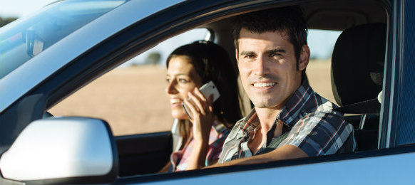 couple inside their hire car