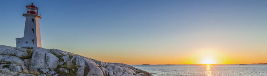 peggys cove's lightouse at sunset